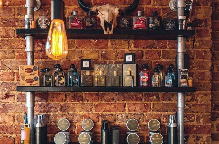 Kendrick's barbershop branded display with industrial fittings and featured bison skull